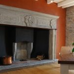 Caminetti e stufe a legna: davvero inquinano? Ne abbiamo parlato con chi innova un antico settore fotografia di un camino Prometeo Stufe